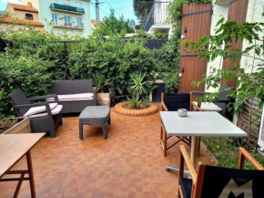 T2 climatisé avec jardin privatif et stationnement